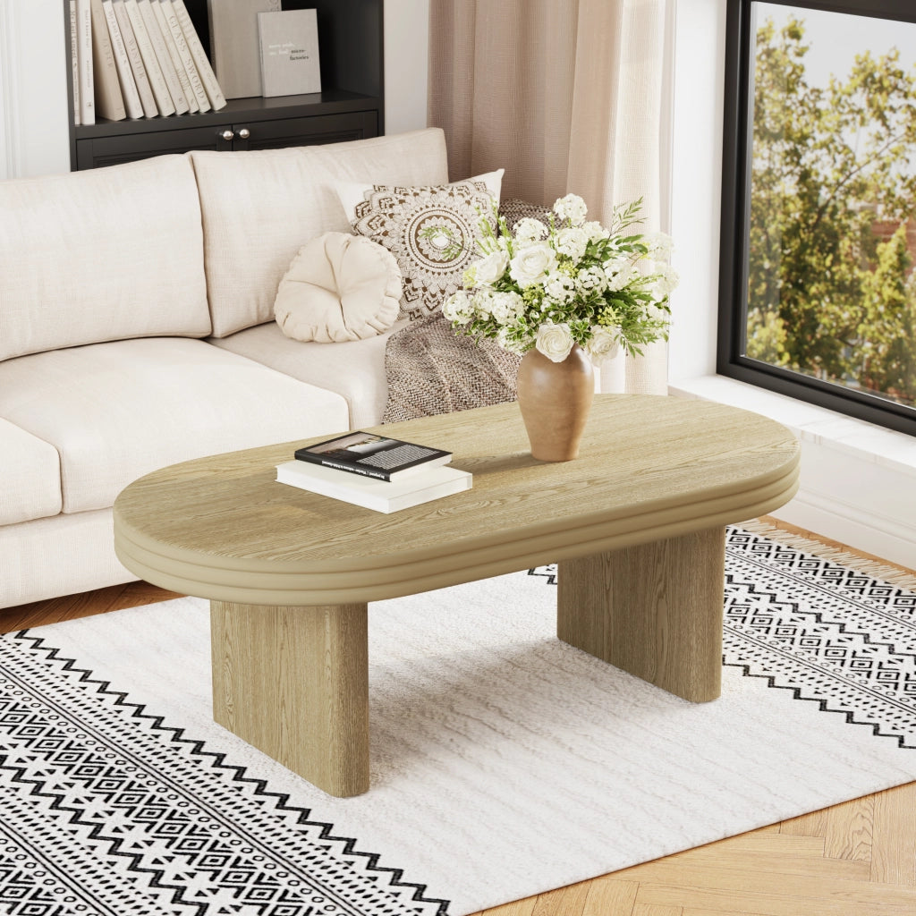 Tavolino Da Caffè Ovale con Base Scanalata; Finitura Legno Naturale; Stile Mid-Century Modern; in MDF; 120×60×41;5 cm