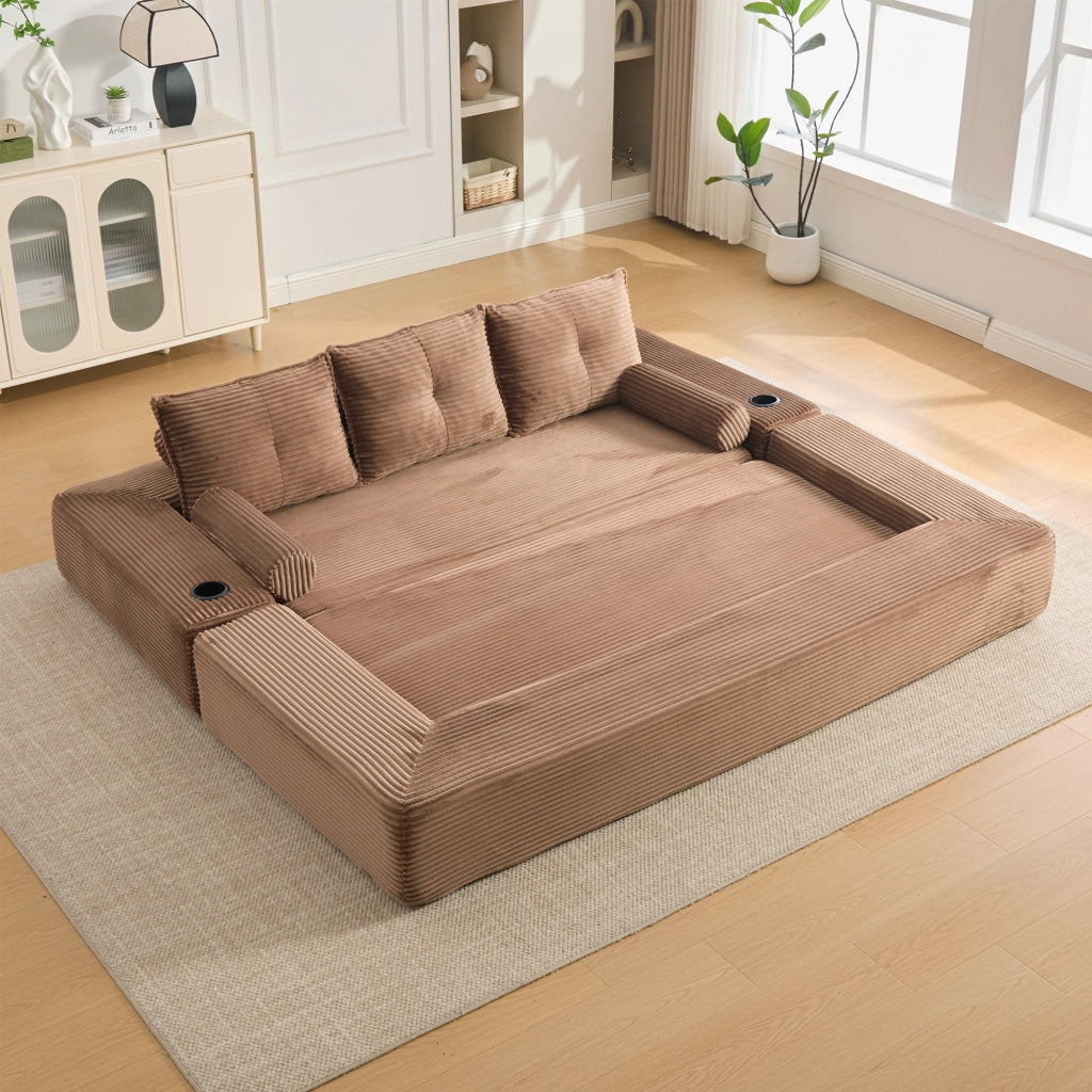 Divano letto modulare con cuscini memory, tasche laterali e portabicchieri in velluto a coste marrone per casa