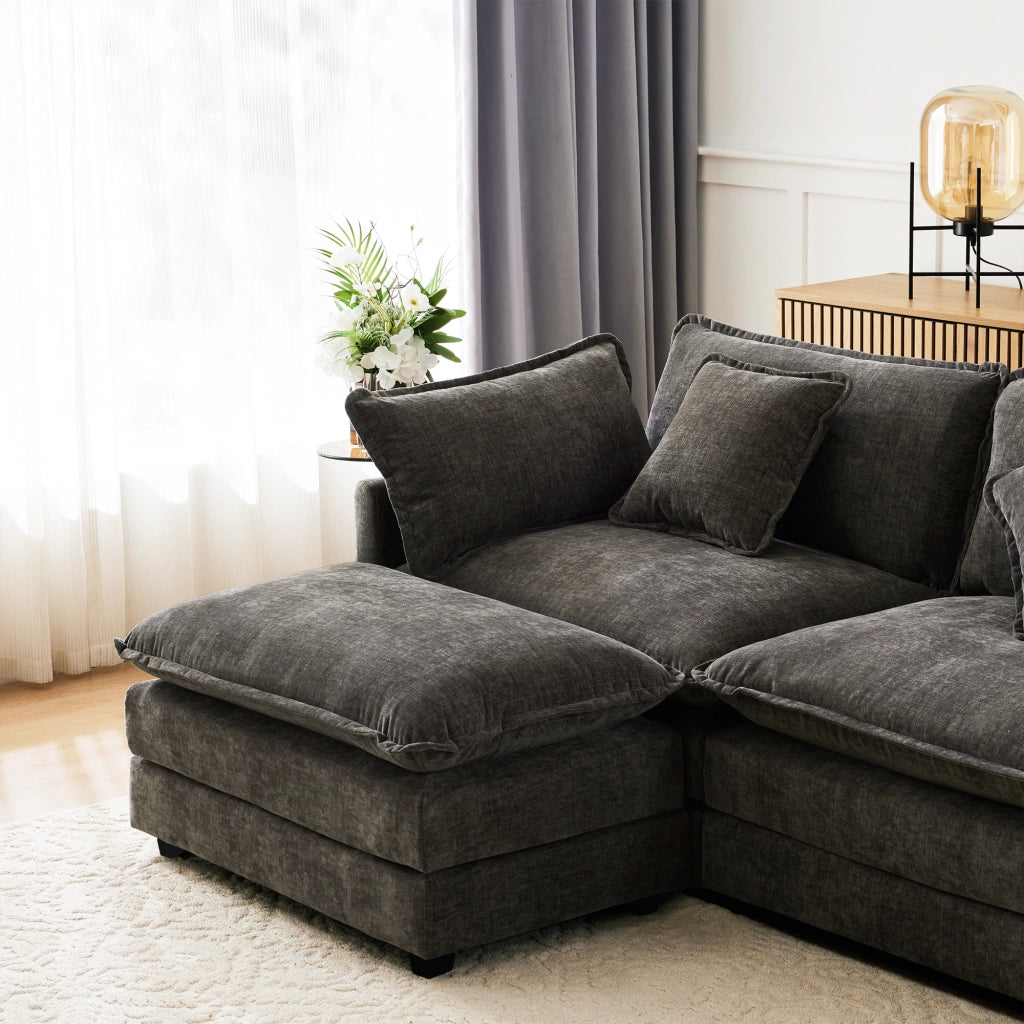 Divano angolare 3 posti con pouf mobile e cuscini lombari in chenille grigio scuro