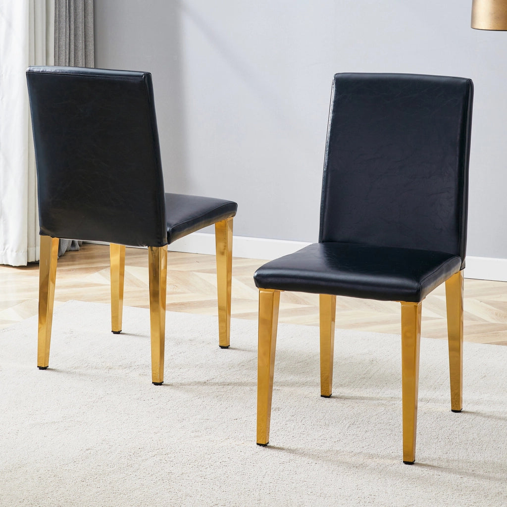 Set di 2 sedie da pranzo moderne in PU nero con gambe in metallo oro; 90 cm