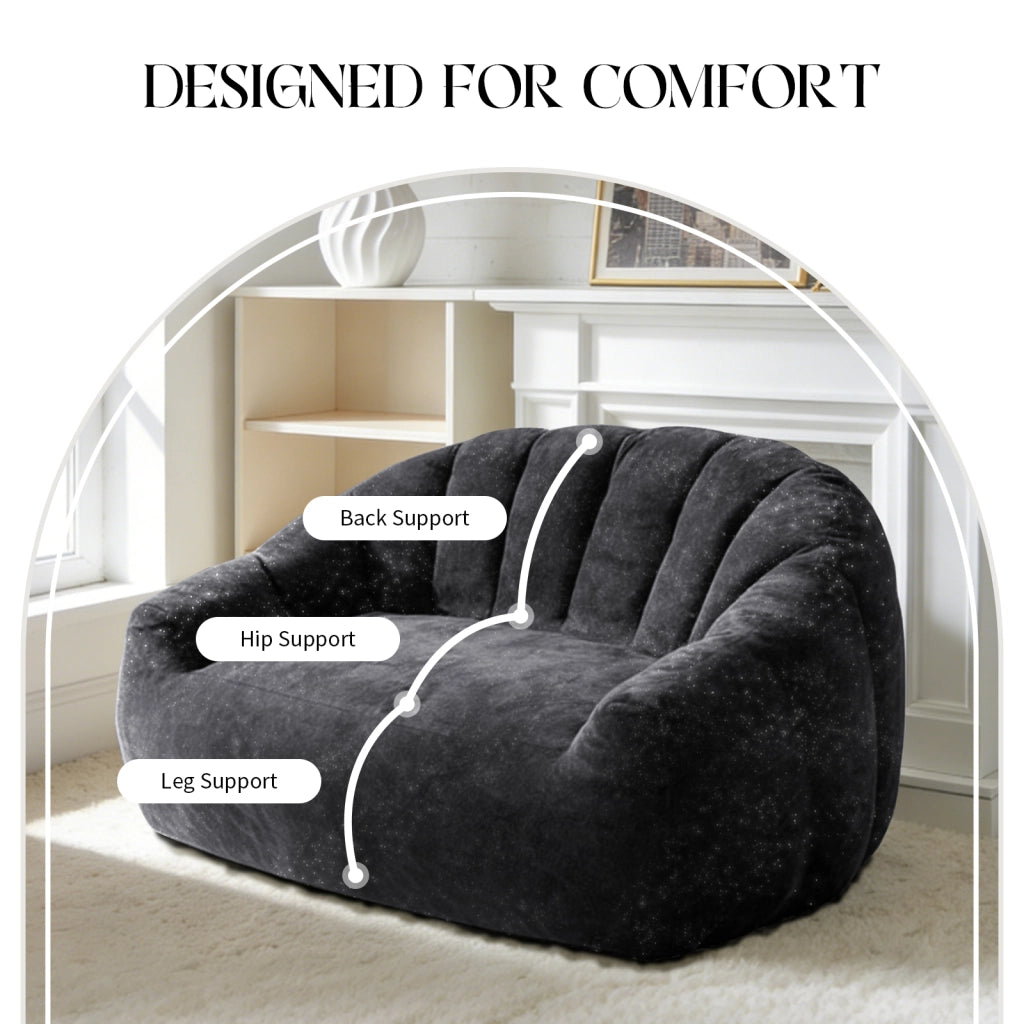 Divano diritto scultoreo con schienale a onda e comfort ergonomico per salotto moderno in flanella nera