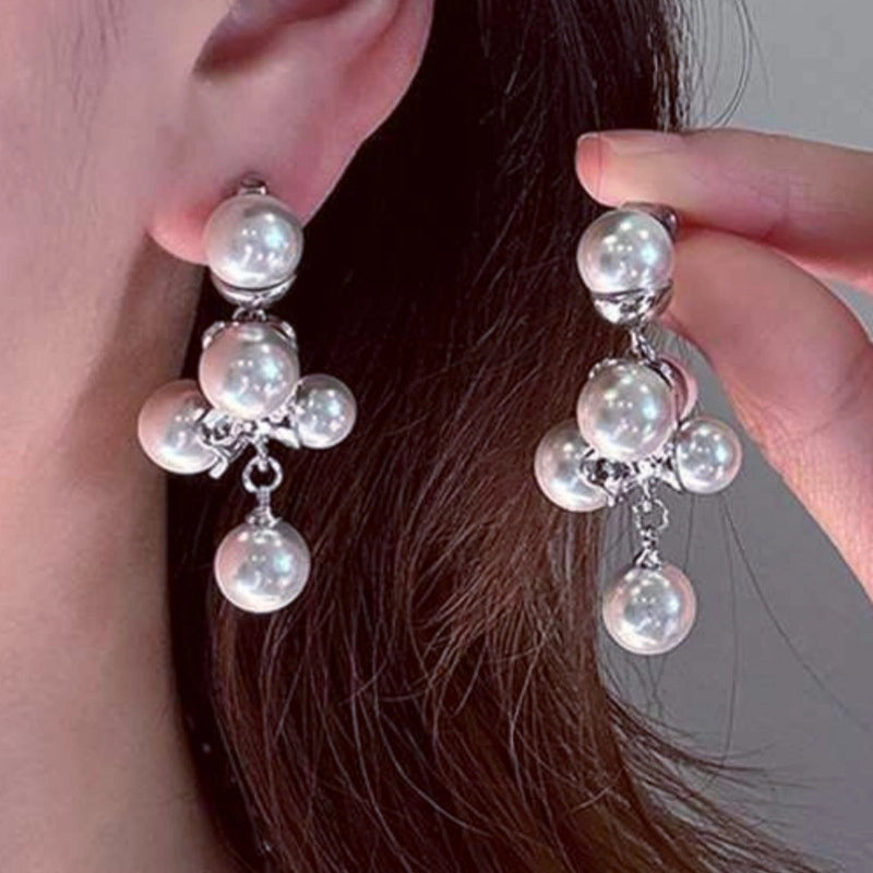 Orecchini pendenti con perle da donna