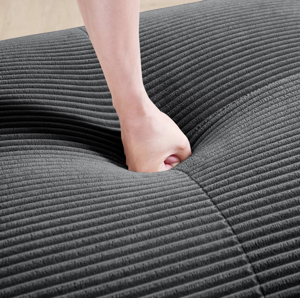 Divano angolare modulare in velluto a coste grigio; design senza struttura e base antiscivolo