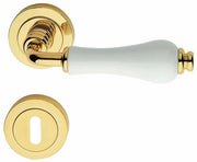 MANIGLIA OTTONE DALIA C/BOCCHETTA CERAM LUC BIA- 1,0 coppie