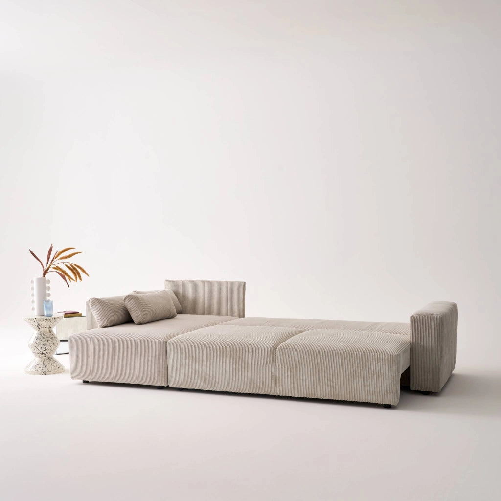 Divano letto angolare reversibile con contenitore in velluto a coste,