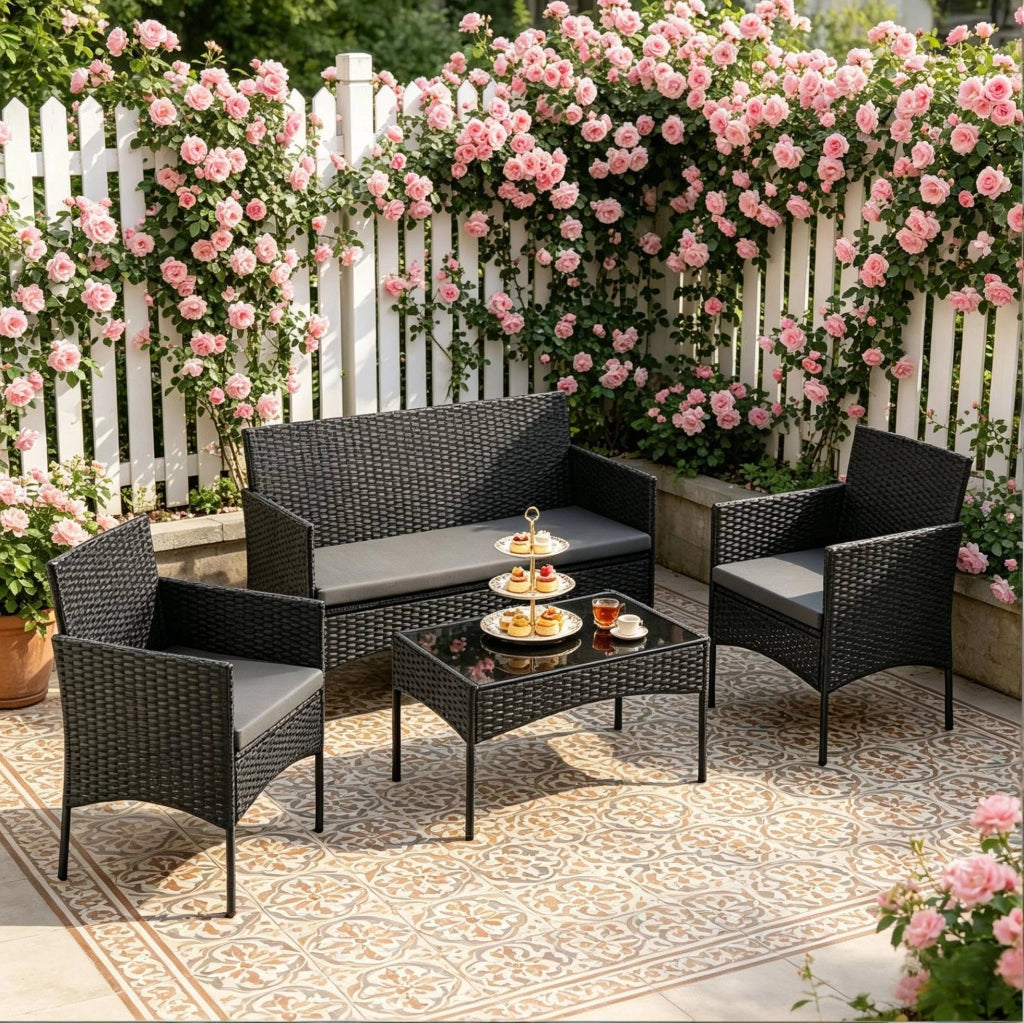 Set da giardino per 4 persone in PE rattan nero con tavolino in vetro temperato