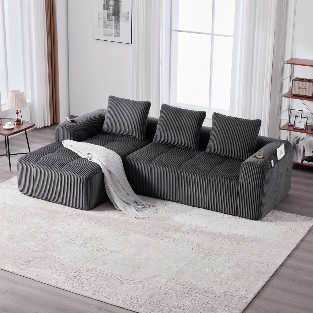 Divano modulare in velluto a coste scuro 253x158x61 cm; con tasche laterali e portabicchieri