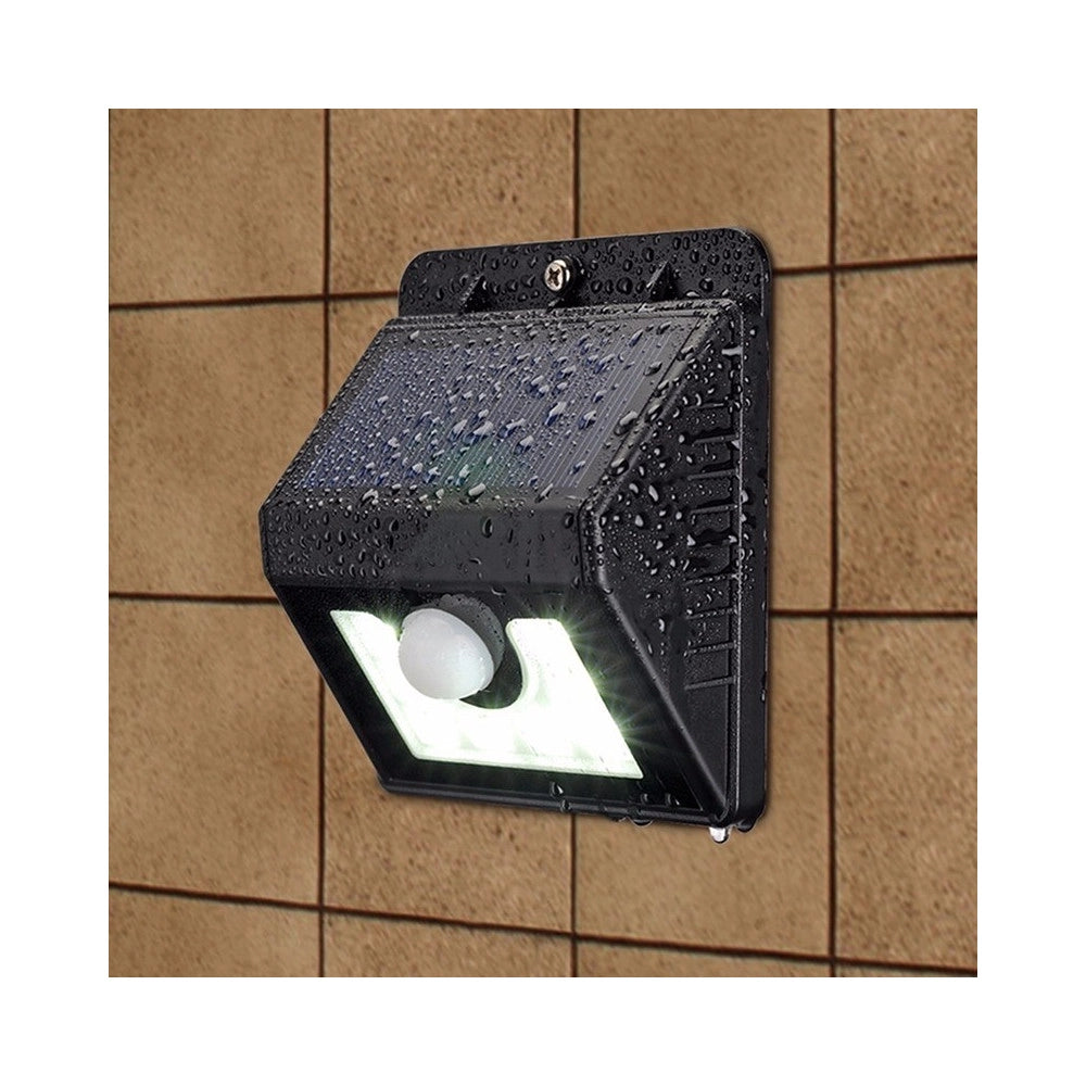 Trade Shop - Faro 8 Led Con Pannello Solare Ricaricabile E Sensore Di Movimento Per Esterno -