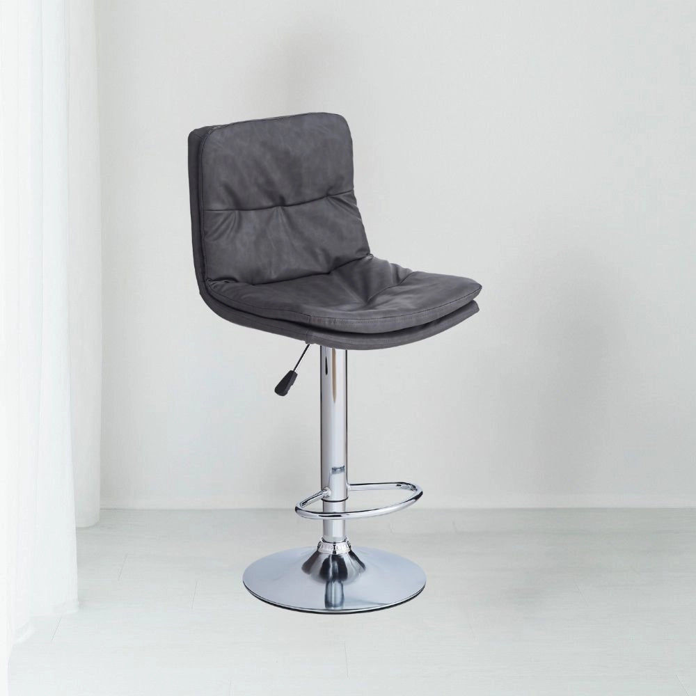 Sgabello Paco con seduta in ecopelle grigio e gamba in metallo inox
