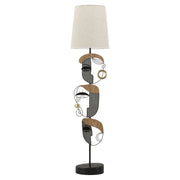 Lampada da terra Picassy in ferro con volti cubisti e paralume in lino naturale