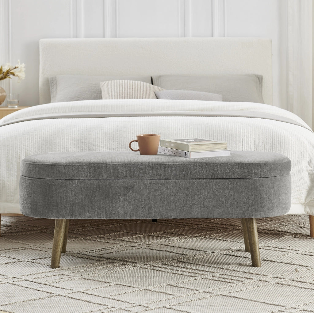 Panca contenitore ovale 110x40x42 cm in chenille grigio scuro con vano 20L