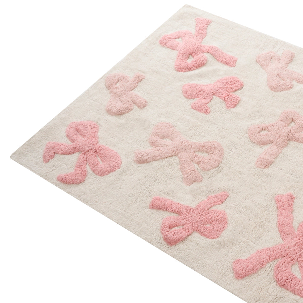 Tappeto per bambini rettangolare taftato in cotone bianco e rosa 90 x 130 cm con nastri decorativi