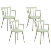Set di 4 sedie da pranzo Seduta imbottita sintetica verde Schienale aperto in ecopelle con braccioli Soggiorno moderno minimalista