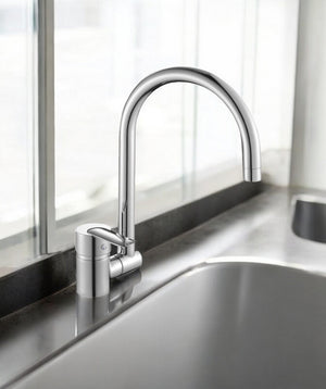 Miscelatore per cucina in ottone cromato, con canna abbattibile sottofinestra laterale