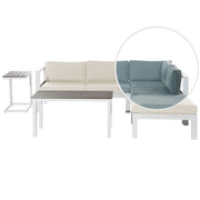 Set divano ad angolo da giardino bianco con cuscini verdi e beige Tavolo a doghe a 5 posti Set moderno scandinavo per conversazioni all'aperto