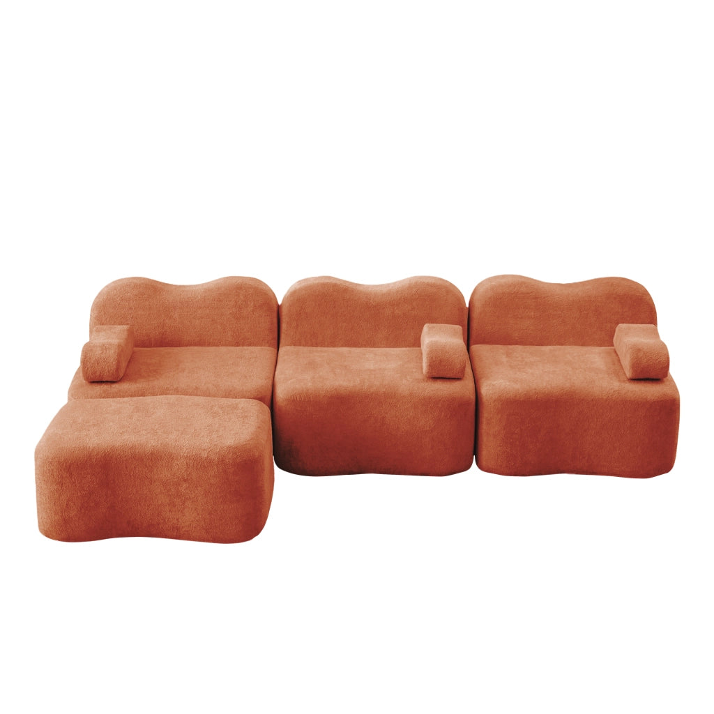 Divano angolare modulare senza struttura con pouf collegabile e seduta profonda in velluto arancione