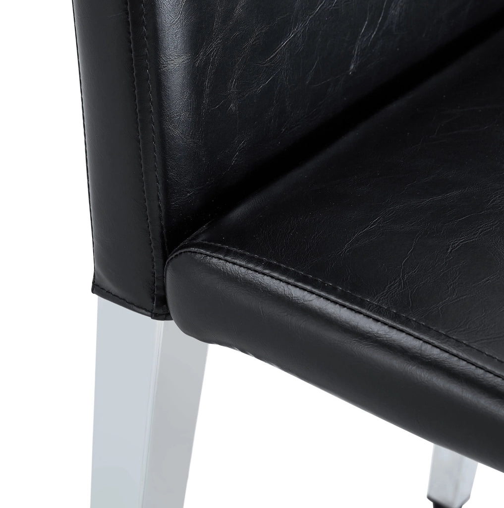 Set di 4 sedie da pranzo moderne in PU nero e metallo argento