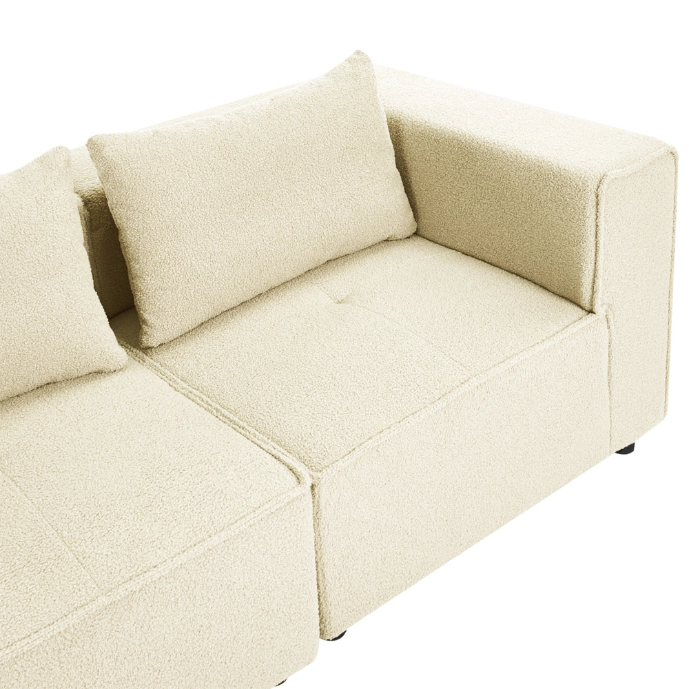 Divano a 4 posti in tessuto bouclè modulare bianco sporco lato sinistro stile minimale moderno