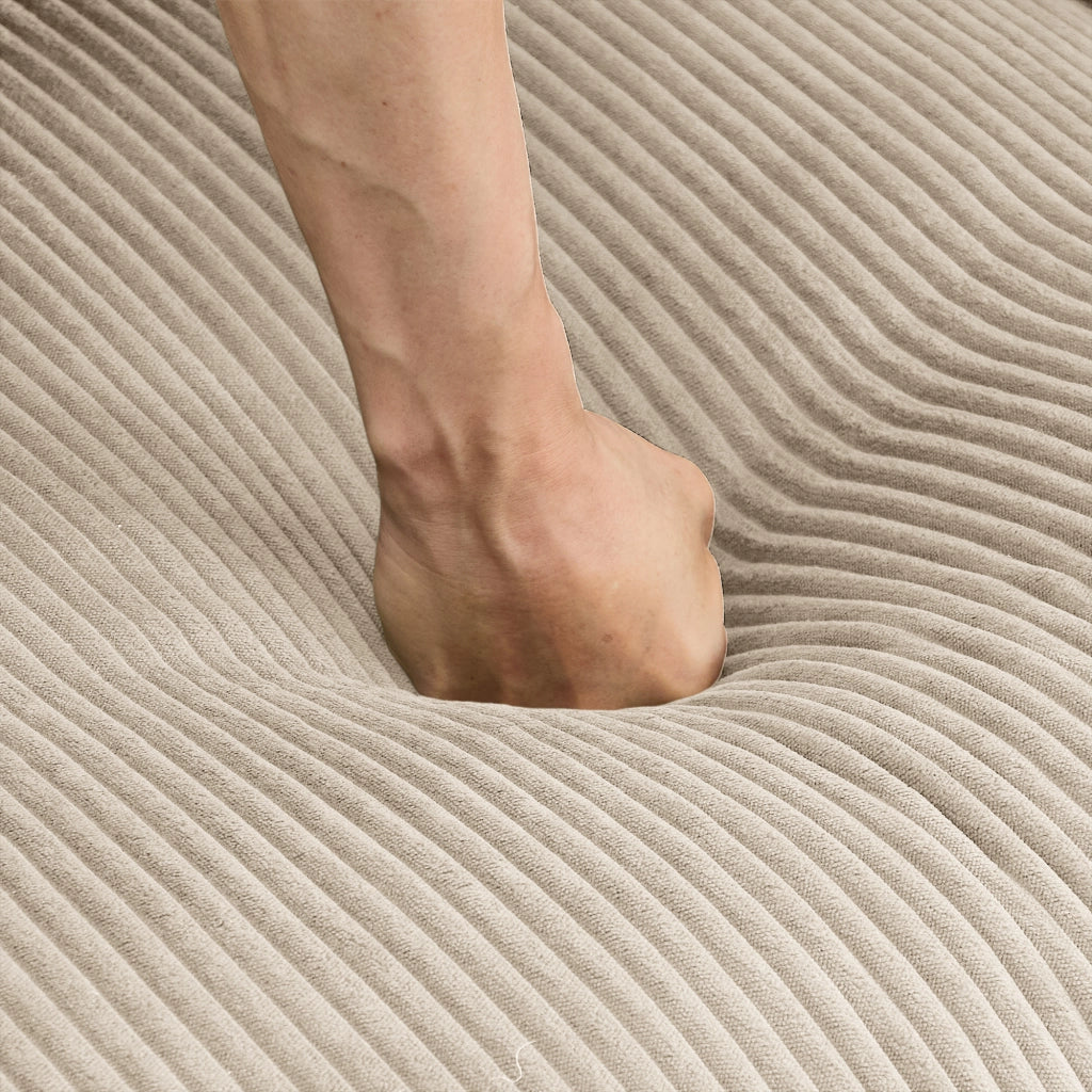 Divano modulare 3 posti a L con pouf e cuscino lombare in velluto a coste beige