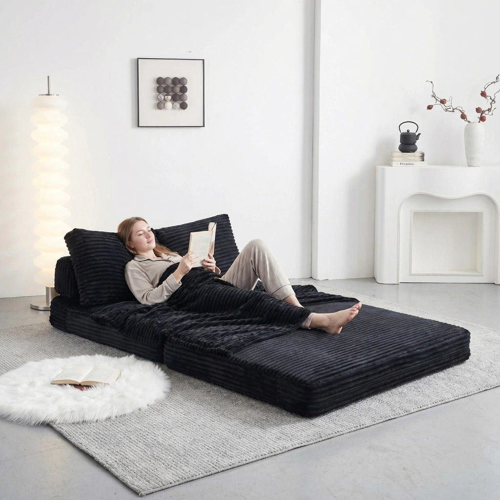 Divano letto 2 in 1 in tessuto nero con schienali rimovibili 150x33x32 cm