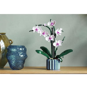 Lego icons 10311 orchidea, set per adulti da collezione, hobby creativi, modellino da costruire in mattoncini con fiori finti - LGO10311