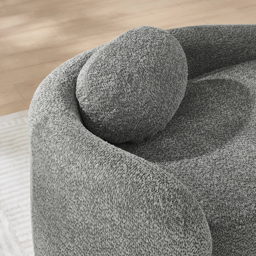 Divano in Teddyfleece con design arrotondato, cuscino di supporto e struttura compatta, colore grigio scuro