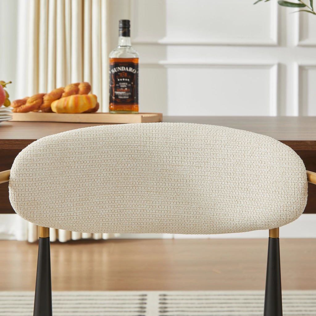 Sedia da pranzo con cuscini in tessuto; altezza regolabile e struttura in metallo nero e oro; beige