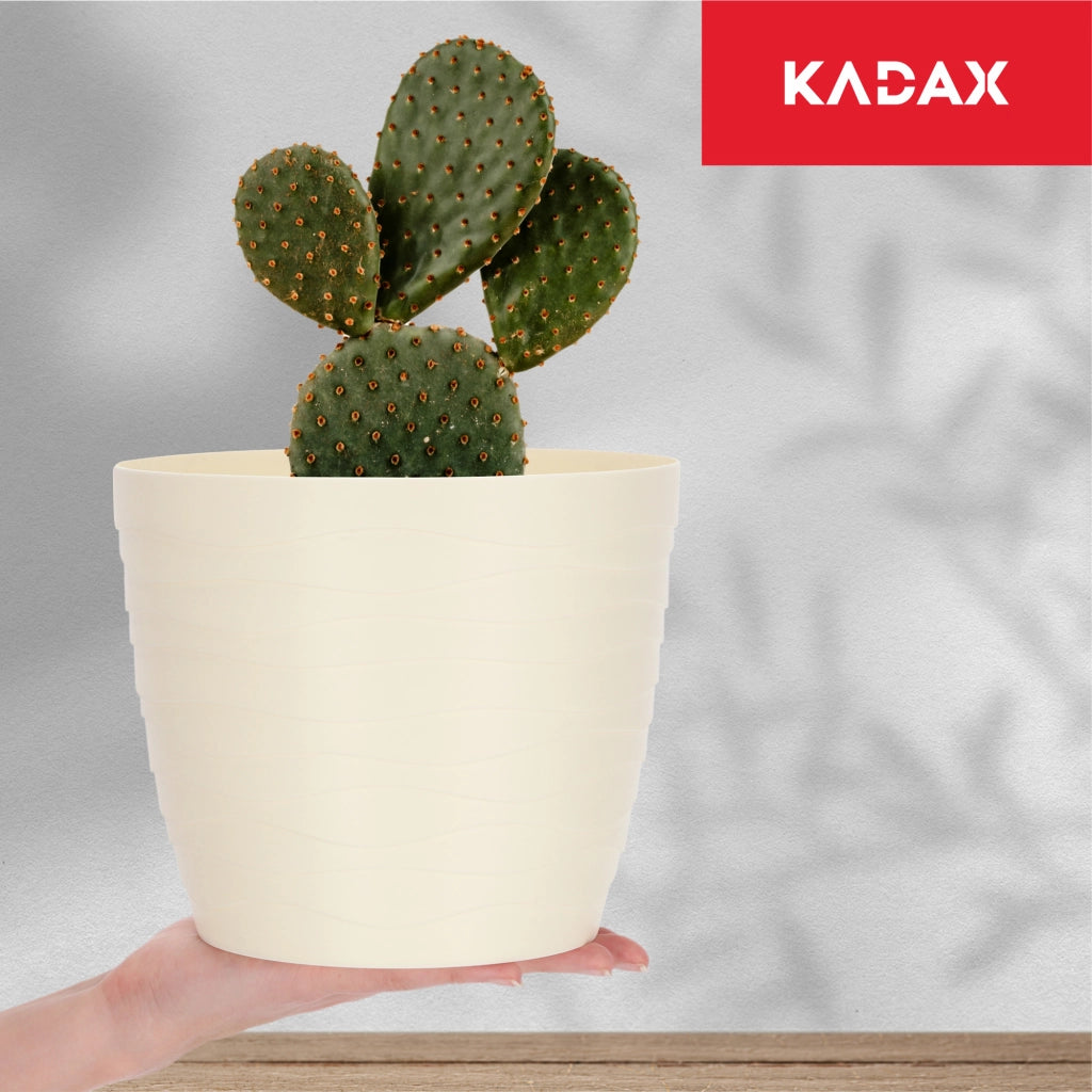 Vaso da fiori KADAX, coprivaso rotondo color crema, 19 cm, in plastica.