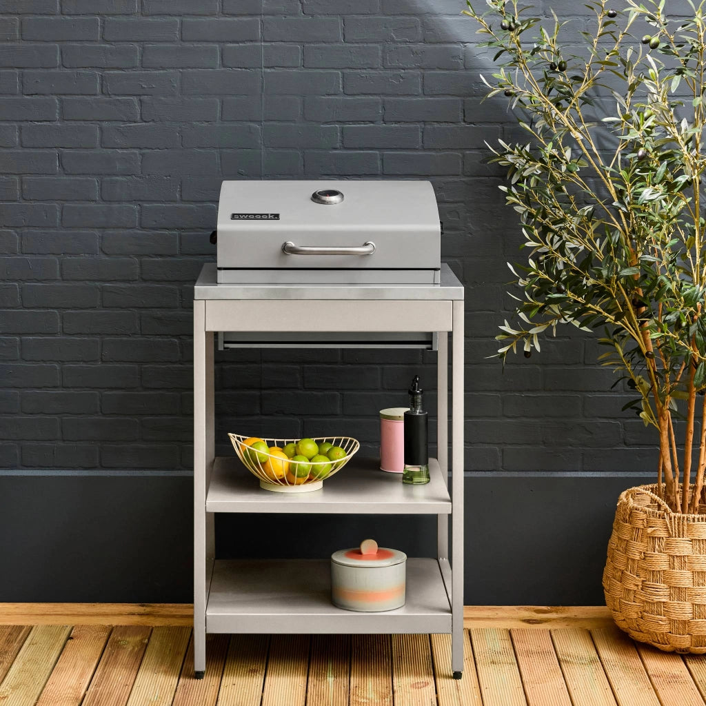 Mobile e barbecue a carbone in acciaio inossidabile con griglia