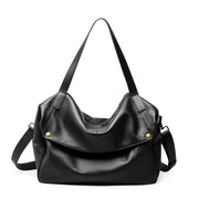 Borsa a tracolla da donna in vera pelle, nera, con manico superiore.