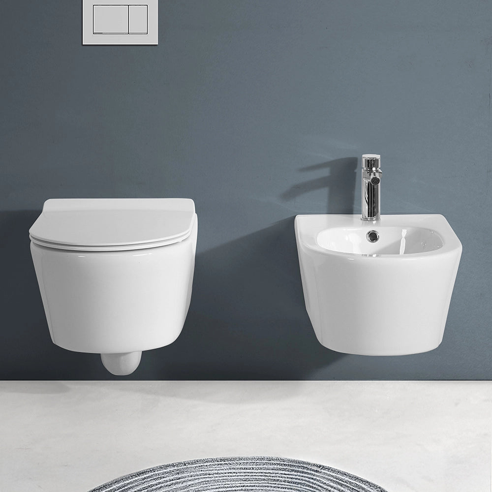 Sanitari Sospesi in ceramica bianco design tondo con copriwc e scarico rimless Ukra