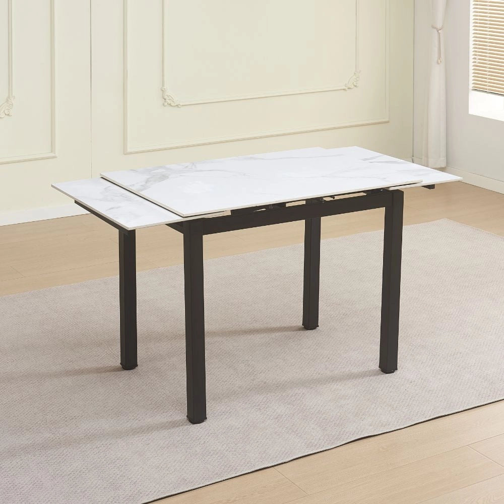 Tavolo allungabile Kyoto con piano in ceramica effetto marmo bianco lucido e struttura in metallo nero