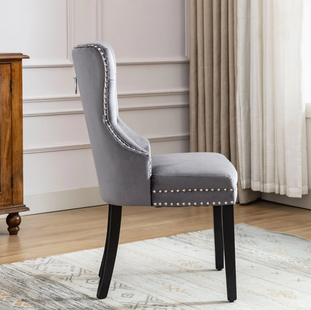 Set di 4 sedie da pranzo in velluto grigio con gambe in legno di gomma