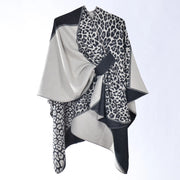 Elegante e versatile scialle jacquard con stampa leopardata per donna, stile etnico autunnale, morbido e caldo.