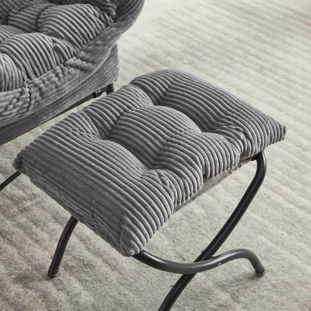 Poltrona lounge grigia con pouf e tasca laterale