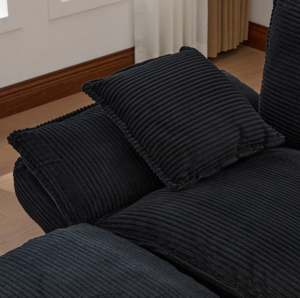 Divano 2 posti con pouf in corduroy nero; USB-C; tasche laterali e vano contenitore 190x132x84 cm