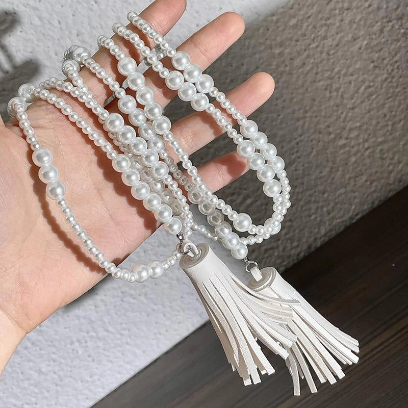 Collana lunga vintage con perline bianche e nappa, regalo di Natale o compleanno.