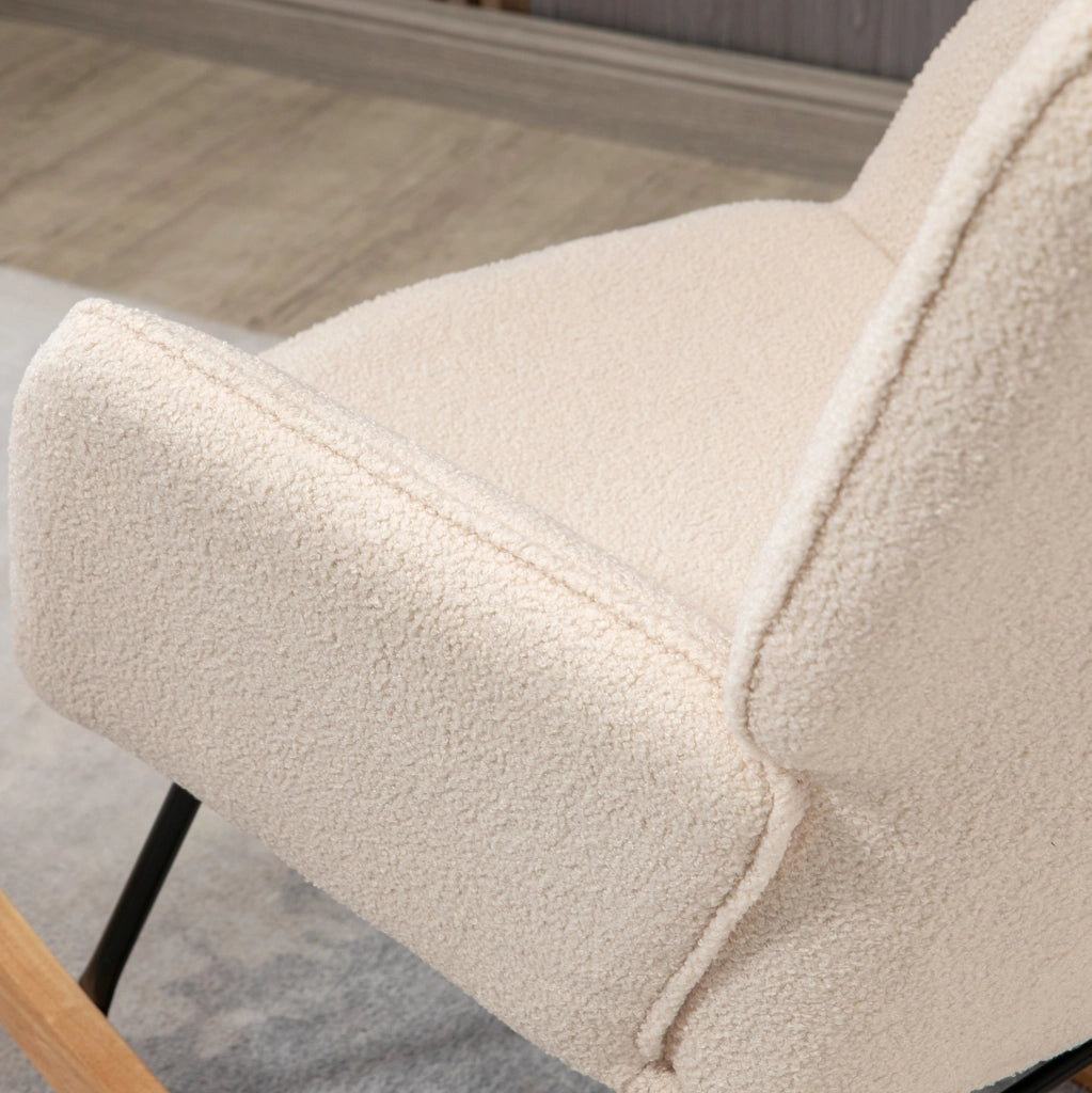 Poltrona a dondolo 98x71x101 cm con schienale trapuntato; in polyester beige