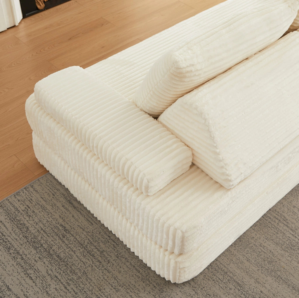 Divano modulare ULEVR 211,5 cm in velluto a coste beige con schienali triangolari e braccioli mobili
