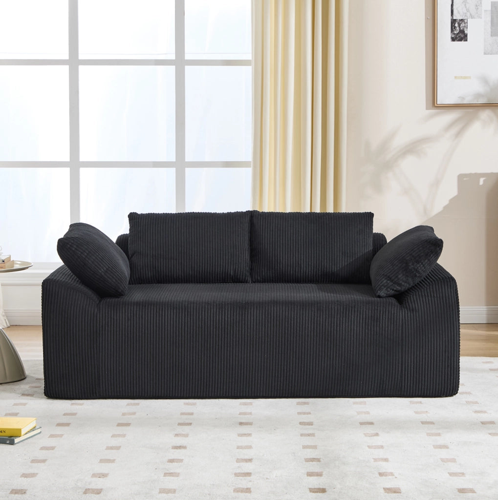 Divano senza struttura compatto in tessuto nero; 67 x 45 x 67 cm; con schienale alto e tasche laterali