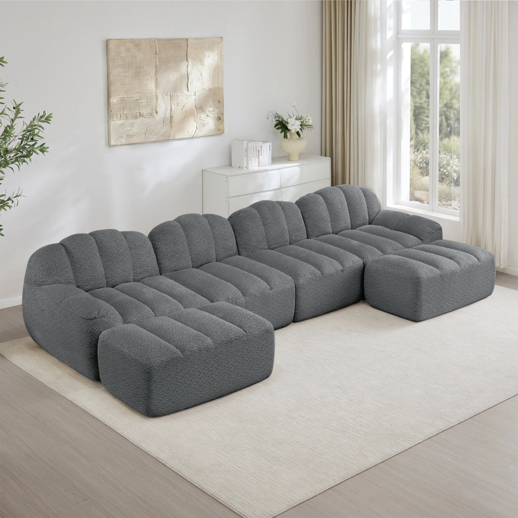 Divano modulare a U 4 posti con ottomans; seduta profonda; in fleece granulato grigio