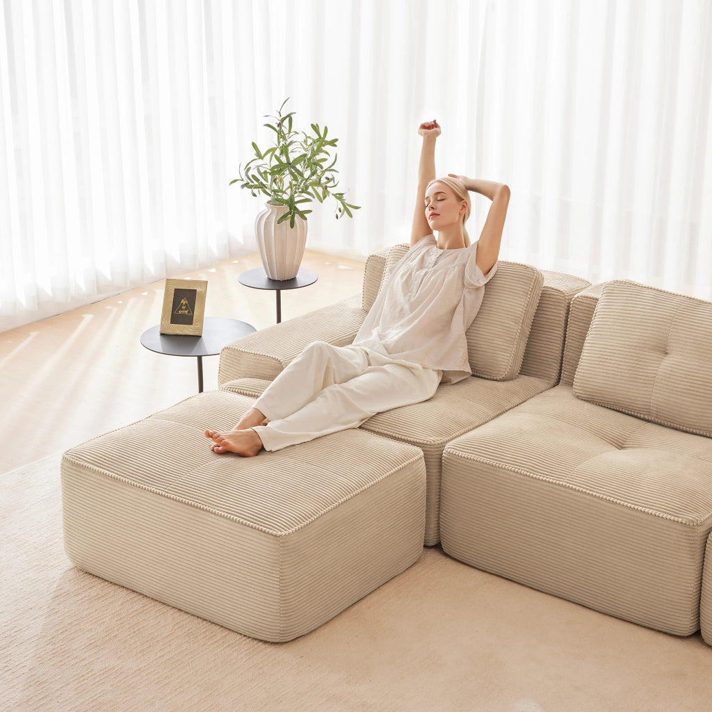 Divano modulare senza struttura in velluto a coste; seduta profonda 74 cm; schienale curvo; beige