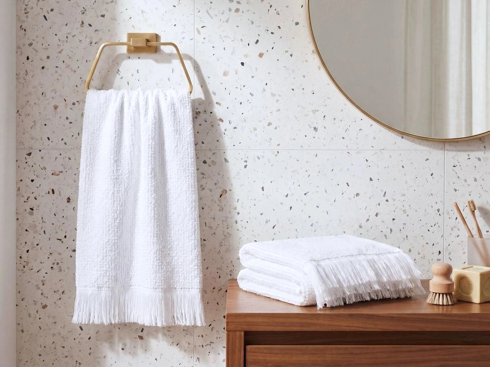 Set di 2 asciugamani bagno in spugna di cotone bianco con nappe decorative