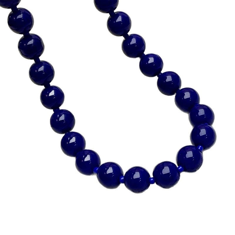 Collana di perline blu scuro