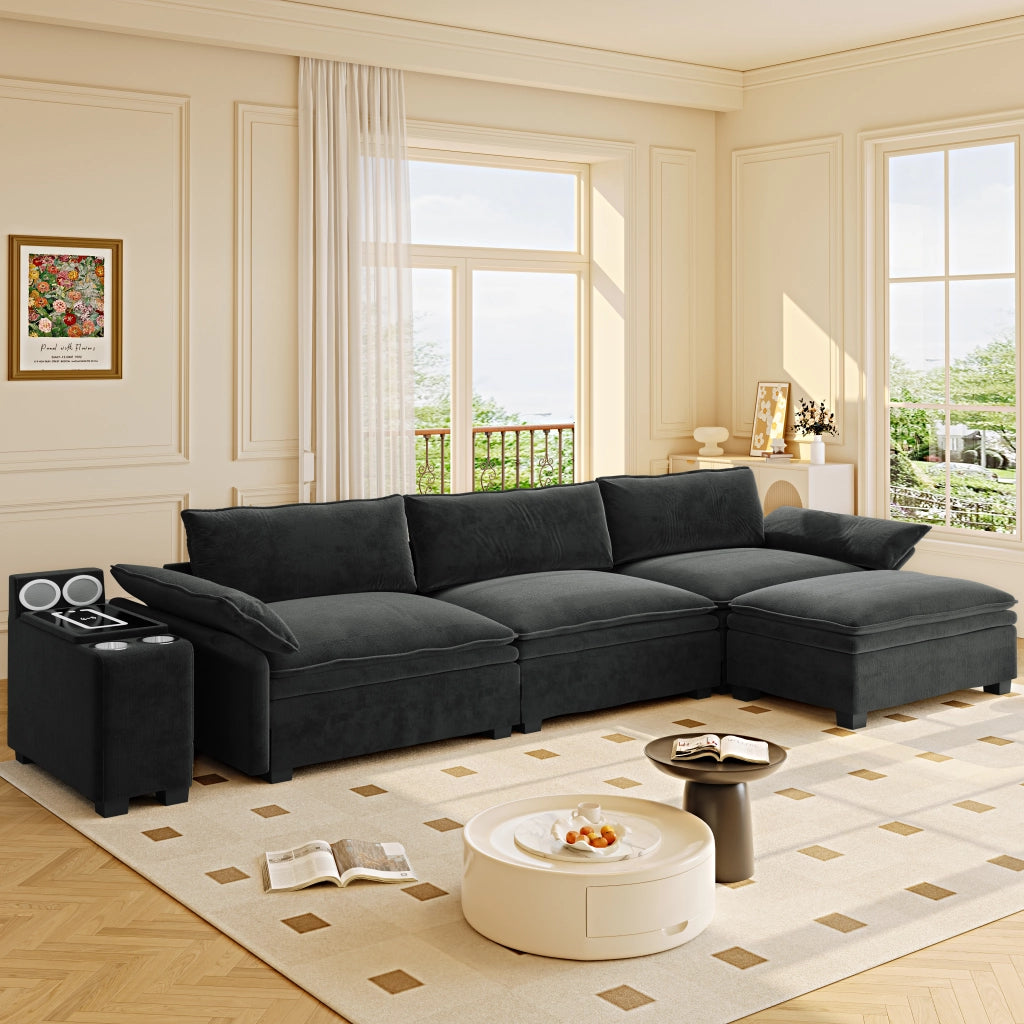 Divano modulare a L 315 cm a 4 posti con pouf; ricarica wireless; altoparlanti e luci; ciniglia; nero