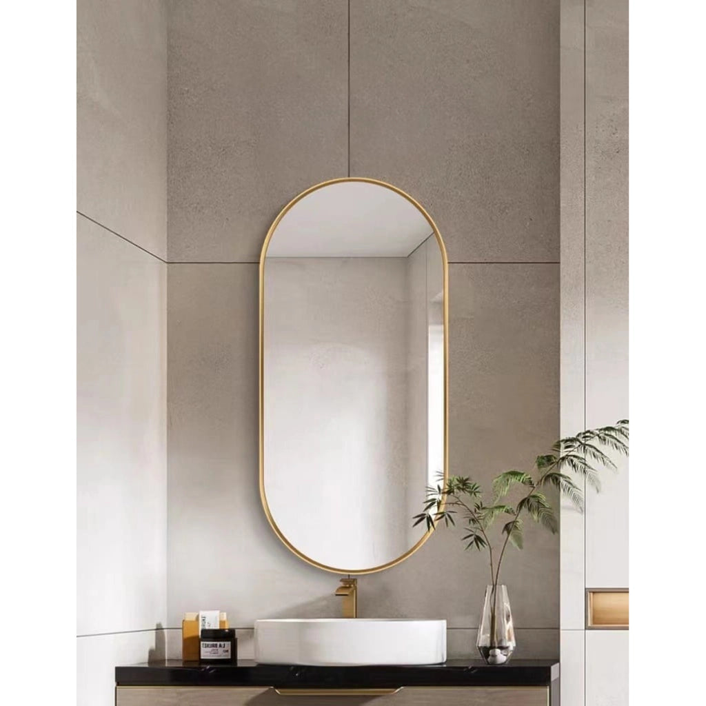 Specchio ovale da parete moderno con cornice dorata