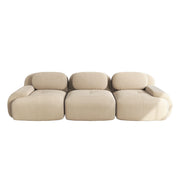 divano angolare modulare 3 posti senza struttura con base antiscivolo e braccioli curvi in velluto a coste beige