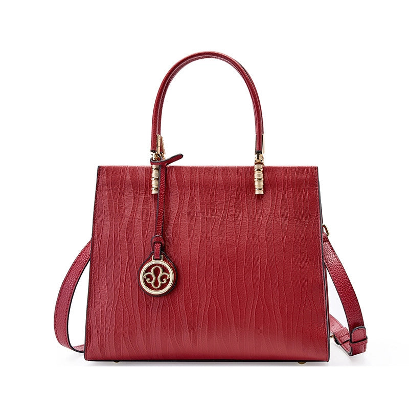 Borsa a tracolla da donna in vera pelle, colore rosso.