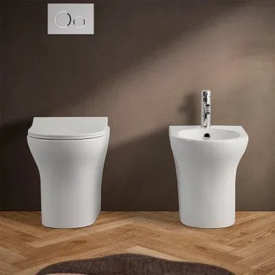 Wc filomuro senza brida bianco lucido con scarico universale  Itaca
