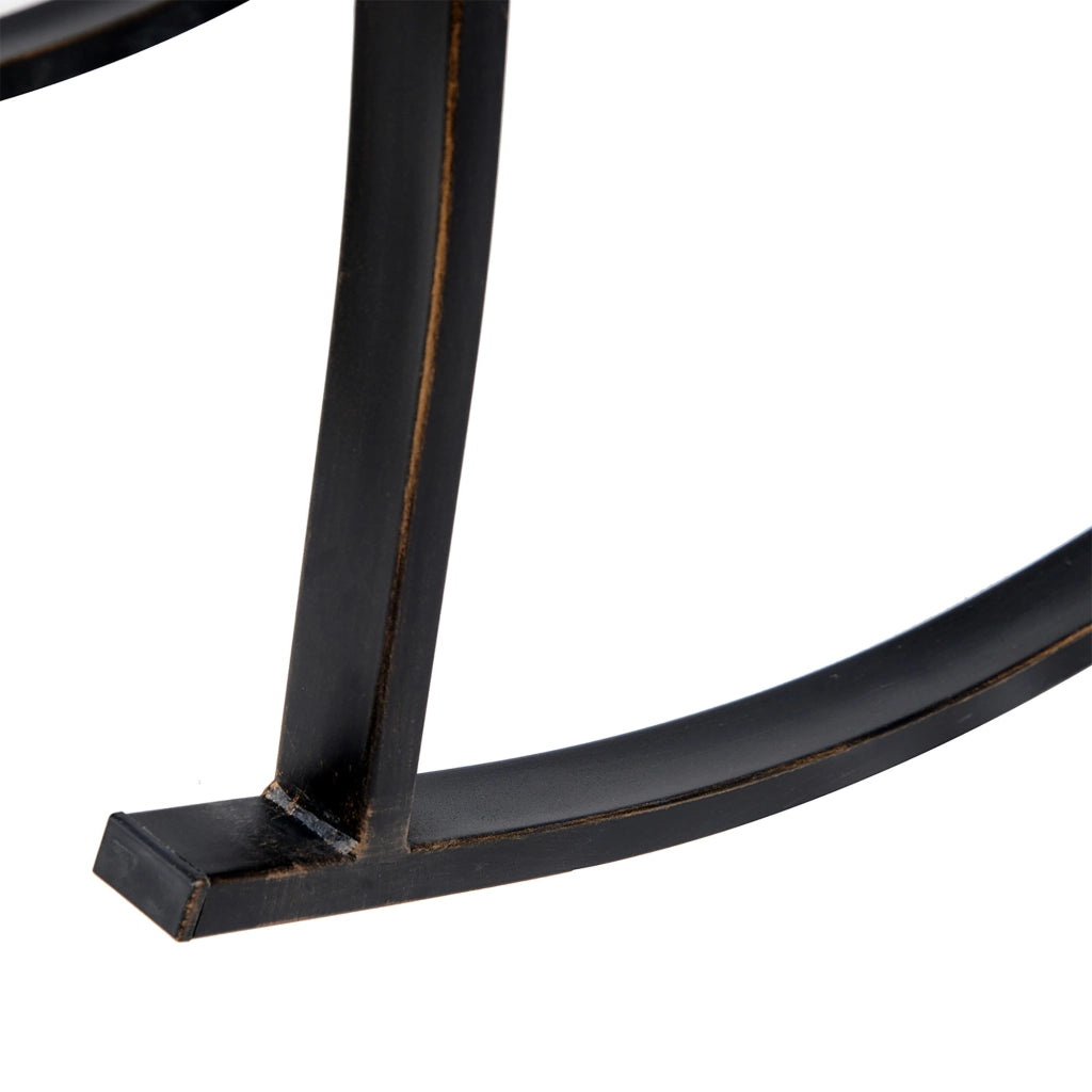 Sedia a dondolo antica in metallo in bronzo elegante e confortevole per patio e giardino